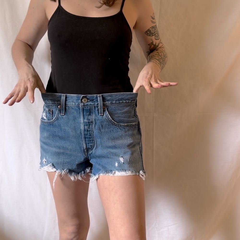 Levi size 27W shorts with button downs instead of zipper